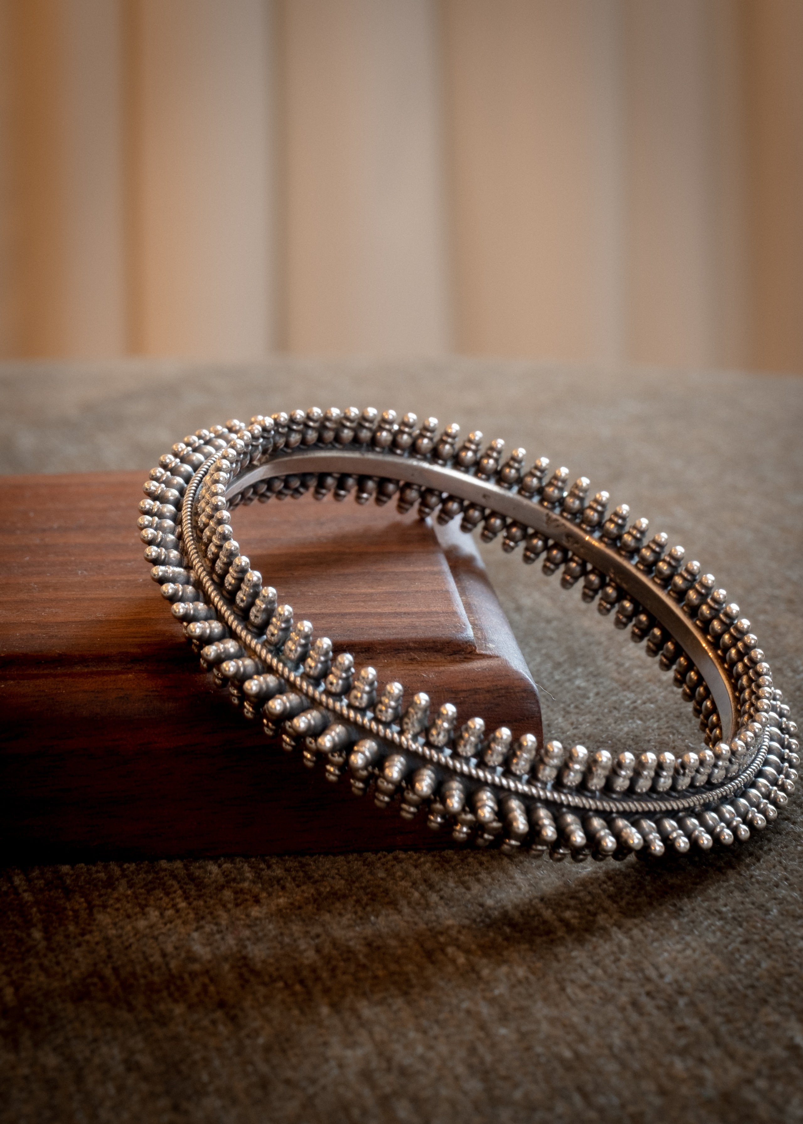 Dhara Bangle - handcrafted oxidized 925 sterling silver bangle - styled view by The Loving Good