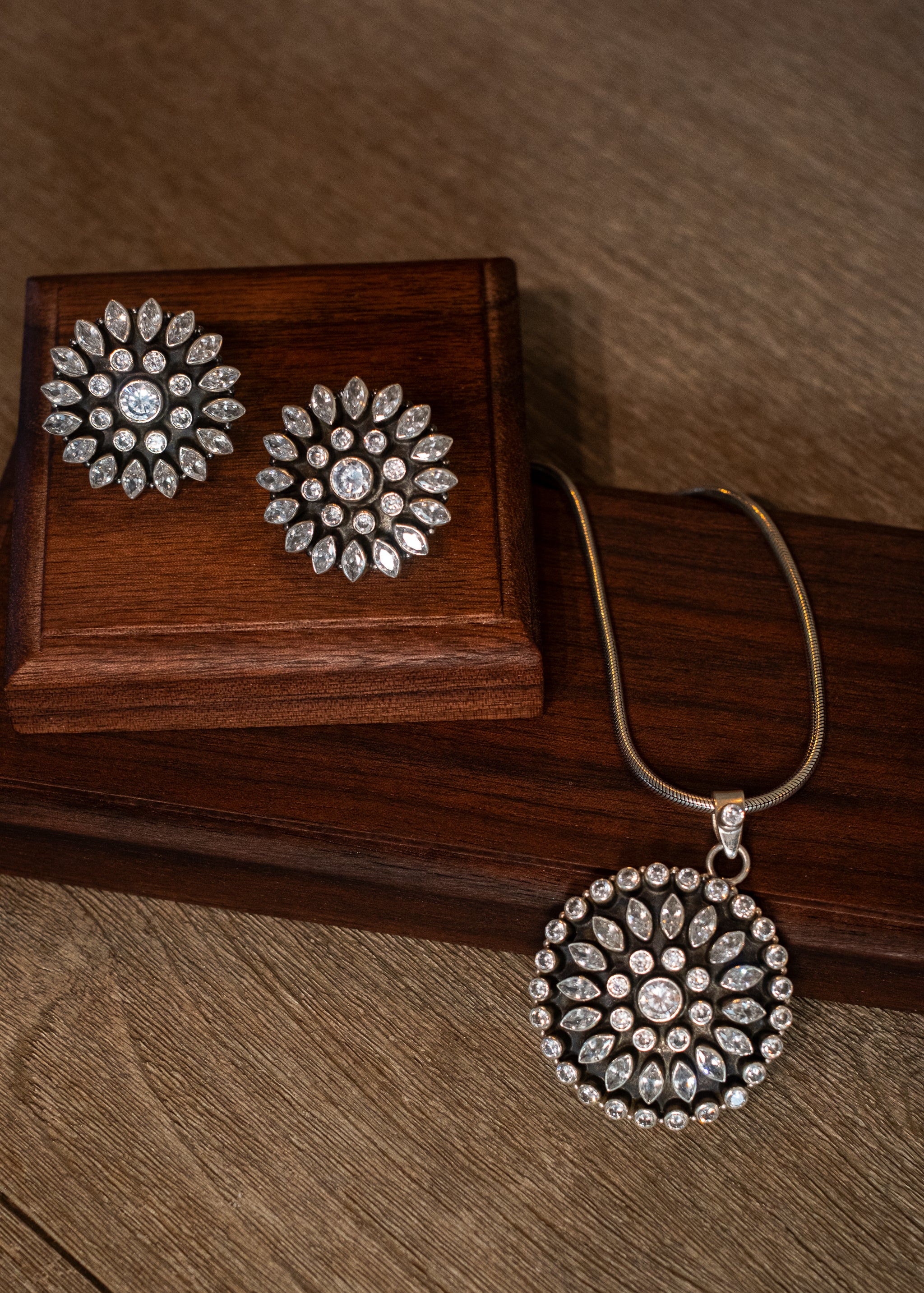 Pushpanjali Set - handcrafted sterling silver floral jewelry set - styled view by The Loving Good